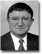 Dr. Constantine G. Soras, Economics Editor